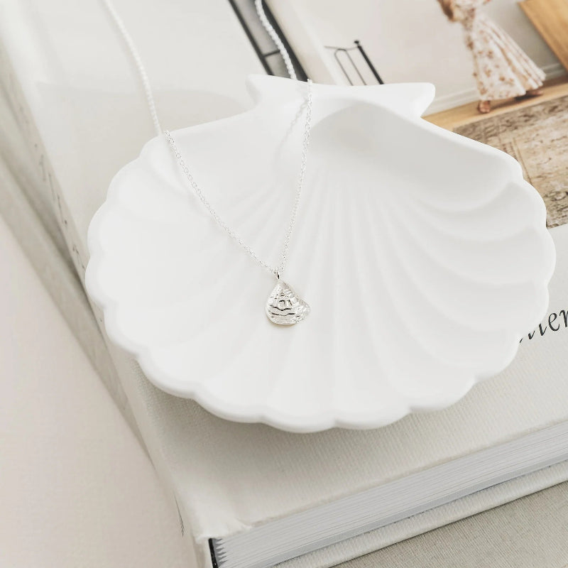 1 & 8 Silver Oyster Necklace in trinket bowel