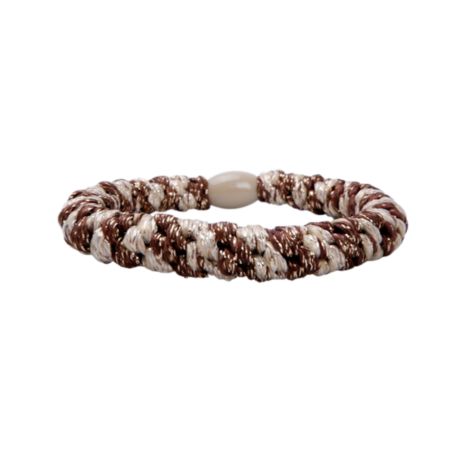 Brown and white braided bracelet on a white background