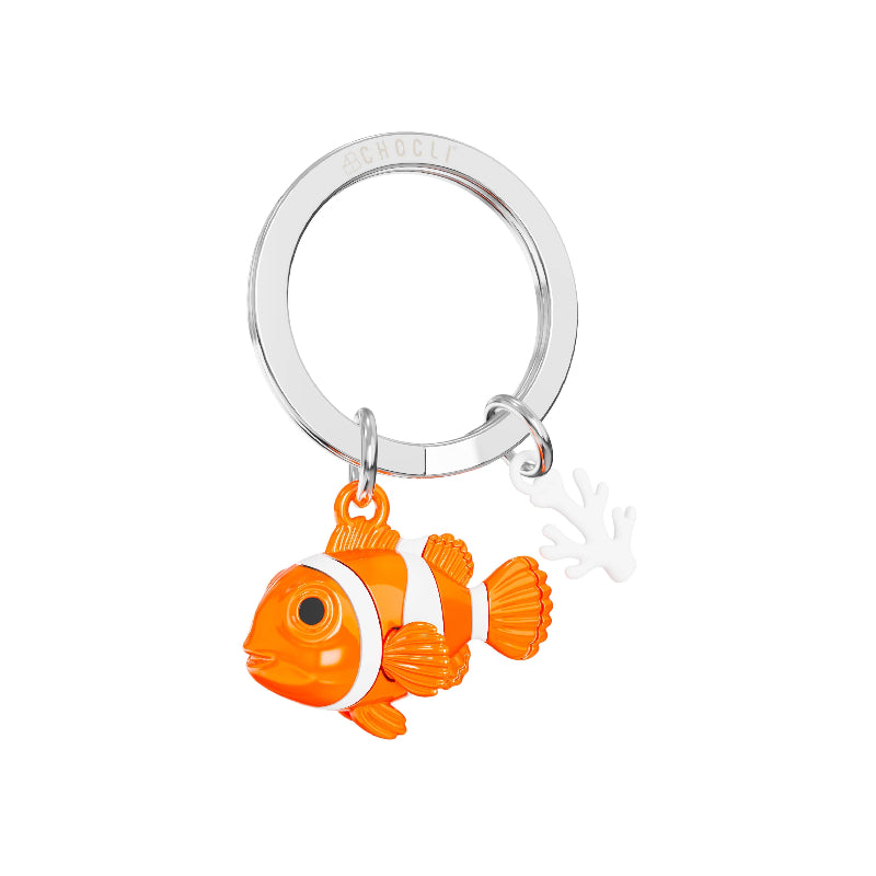 A silver-tone metal keychain featuring a dangling orange and white clownfish charm with a small white coral-shaped charm, shown on a plain white background.