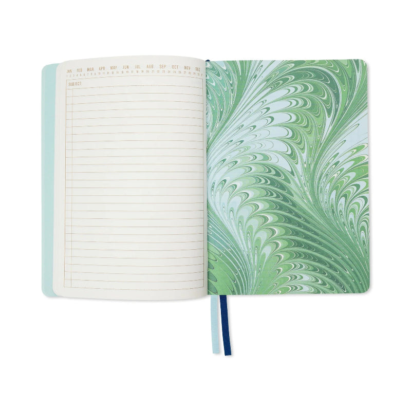 An open notebook with lined blank pages on the left and a green marbled cover on the right, shown on a clean white background.