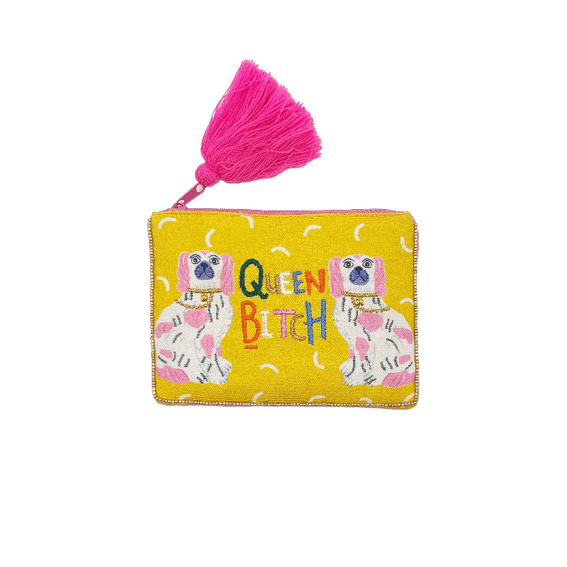 A bright yellow zippered pouch with a large pink tassel zipper pull. The front features embroidered pink-and-white dogs and the text 'QUEEN BITCH' in multicolored letters.
