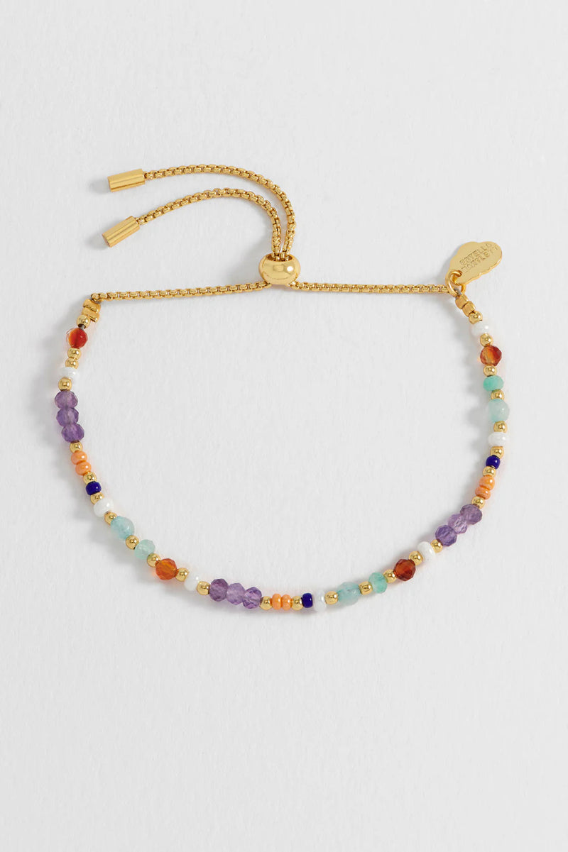 Multicolored beaded bracelet on a white background