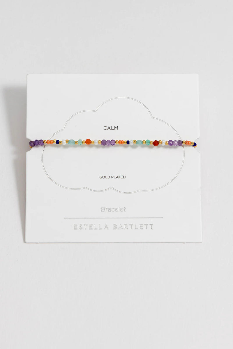 Colorful beaded bracelet on a white card with 'Stella Bartlett' branding.