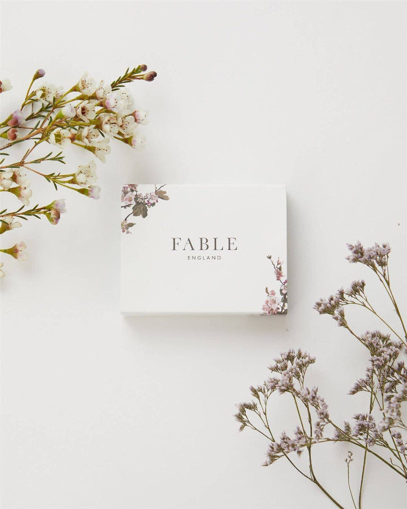 Fable England box with floral elements on a light background