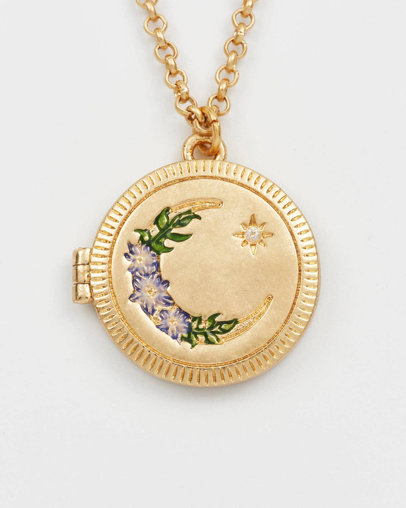 Fable Nightshade Moon Round Gold Locket Chain Necklace with floral design on a light grey background