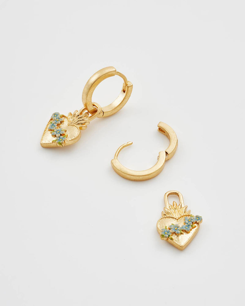Fable Sacred Heart Huggie Earrings on a light grey background