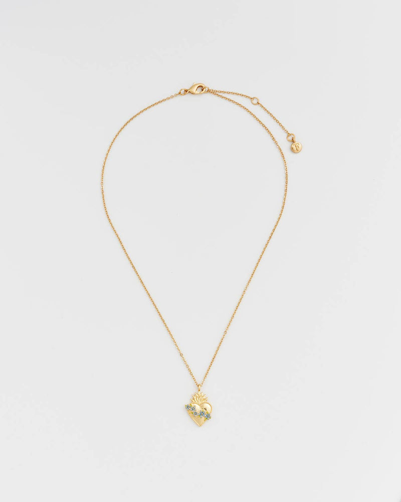 Fable Sacred Heart Necklace with a heart-shaped pendant on a light grey background