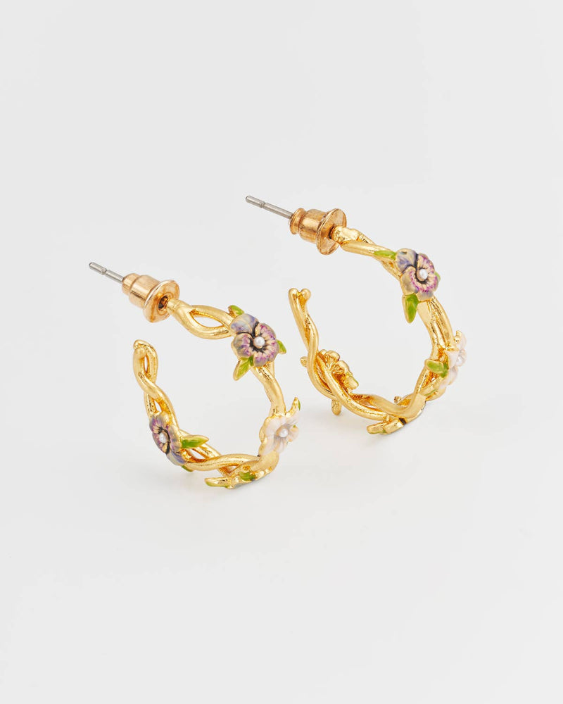 Fable Wildflower Garden Hoop Earrings with floral designs on a light grey background