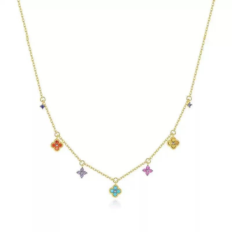 gold chain necklace with multi coloured flower charms