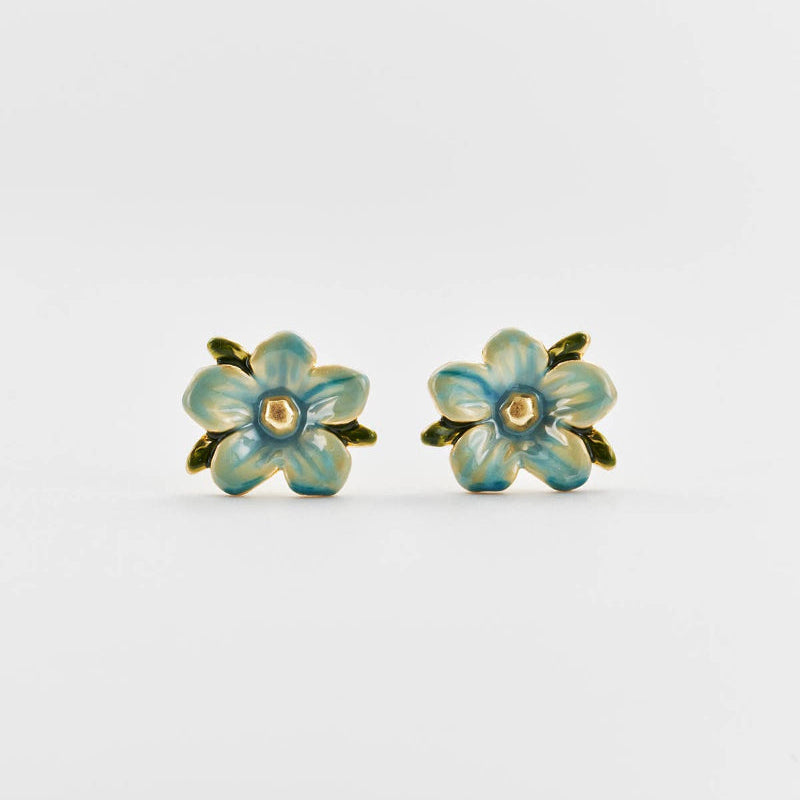 Pair of flower-shaped earrings with gold accents on a white background