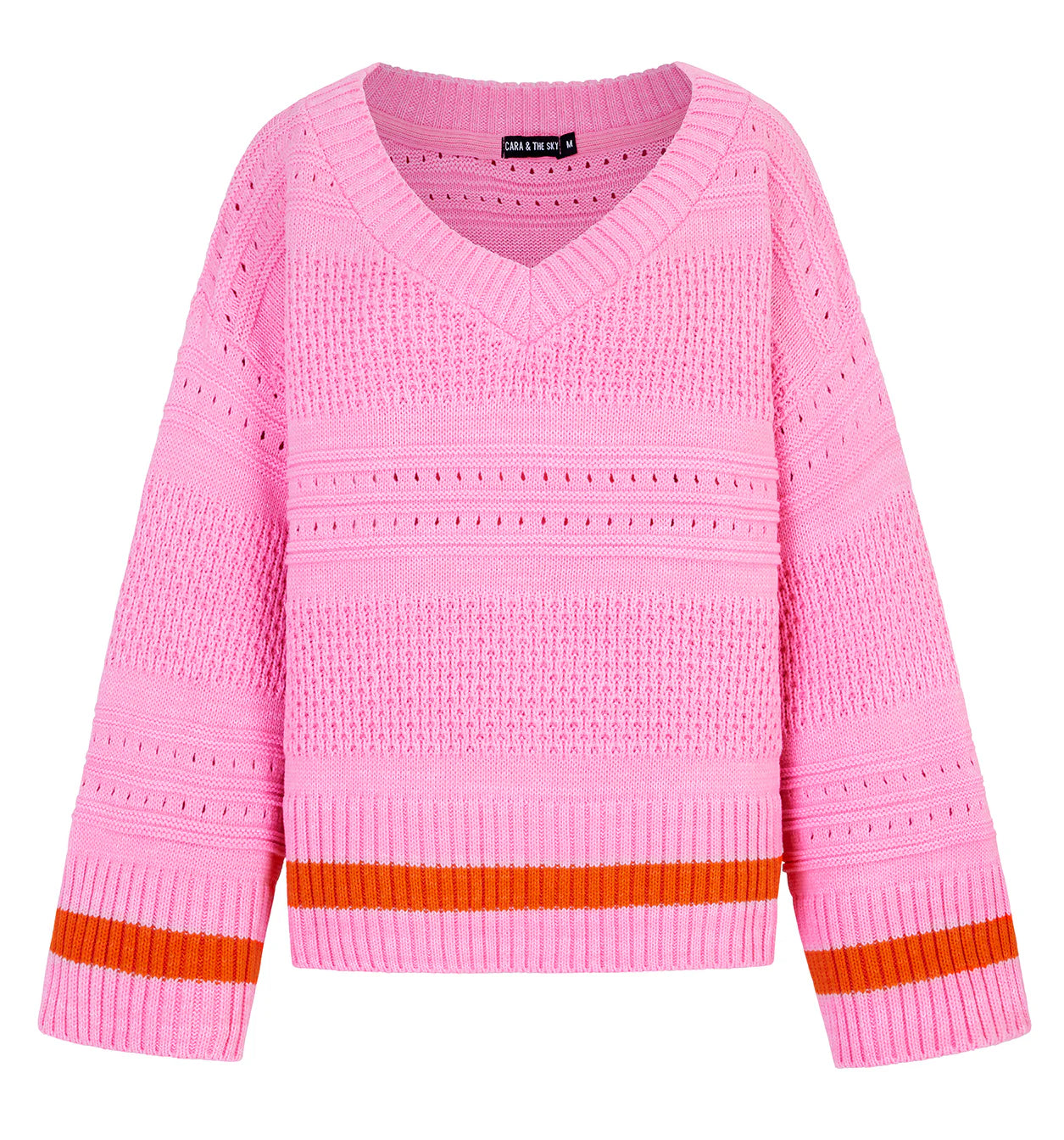 Pink sweater with orange accents on a white background