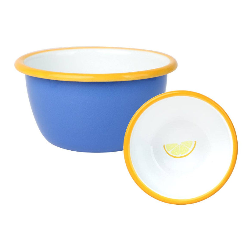 Blue bowl with yellow rim and white interior, showing a lemon slice design on a white background.