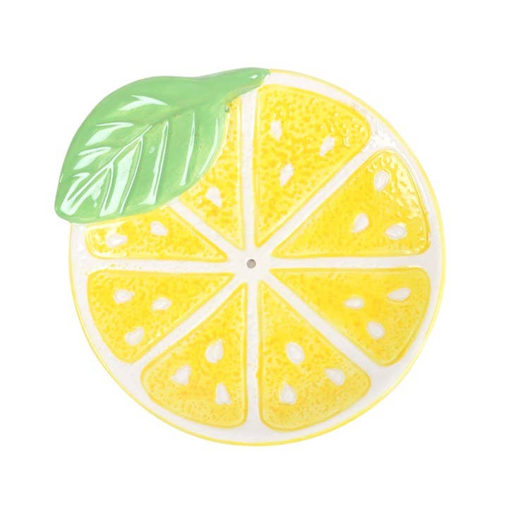 Lemon-shaped object with a green leaf on a white background