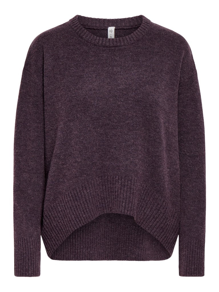 A dark plum purple knit sweater with a crew neck and a distinctive asymmetrical, curved hem, shown against a plain white background.
