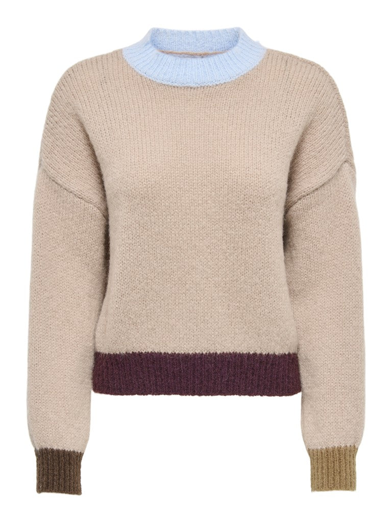 A textured knit high neck sweater in beige with a light blue ribbed collar, a dark purple ribbed hem, and olive green ribbed cuffs.