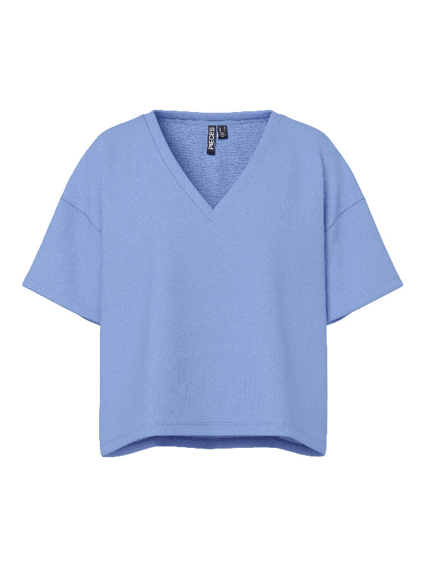 Light blue blouse on a white background