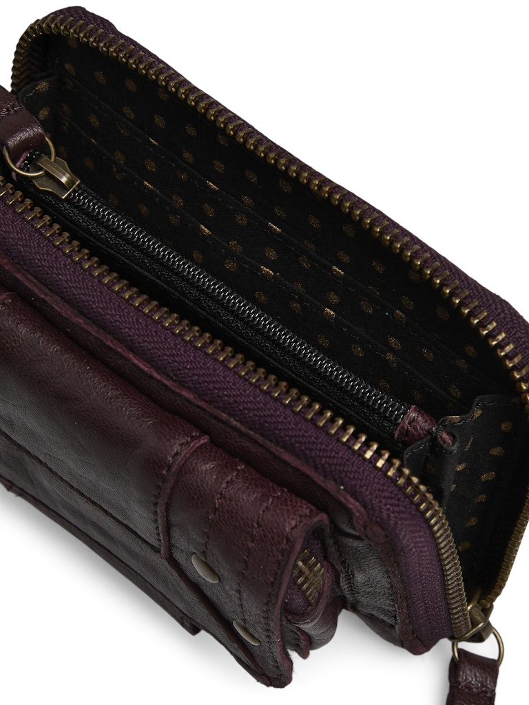 Close-up of a brown leather bag with a zipper on a white background