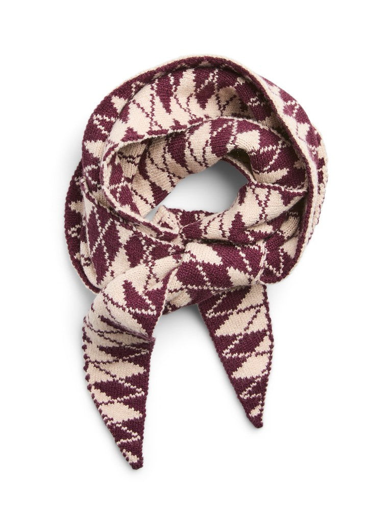 A knitted scarf with a geometric pattern in burgundy and cream, styled in a loop with a bow on a plain white background.