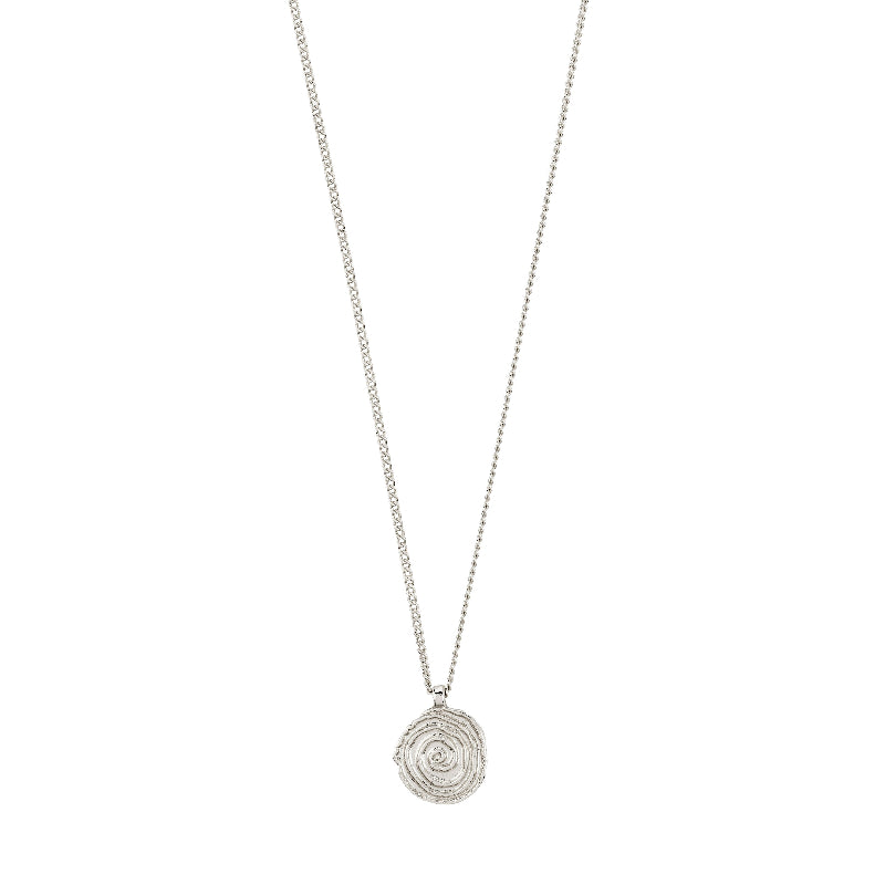 Silver necklace with a circular pendant on a white background