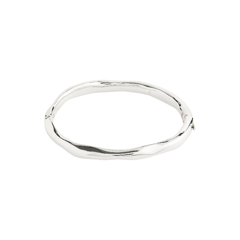 Silver bangle on a white background