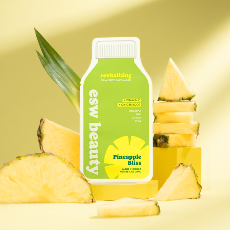 Esw Beauty Pineapple Bliss face mask with pineapple slices on a yellow background