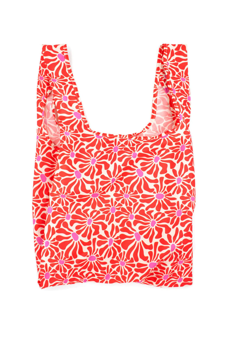 Reusable shopping bag with red and pink floral pattern on a white background