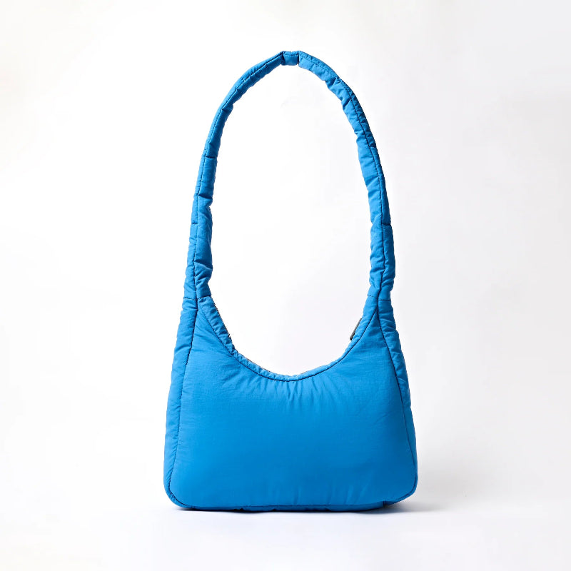 Roka Belize Blue handbag on a white background
