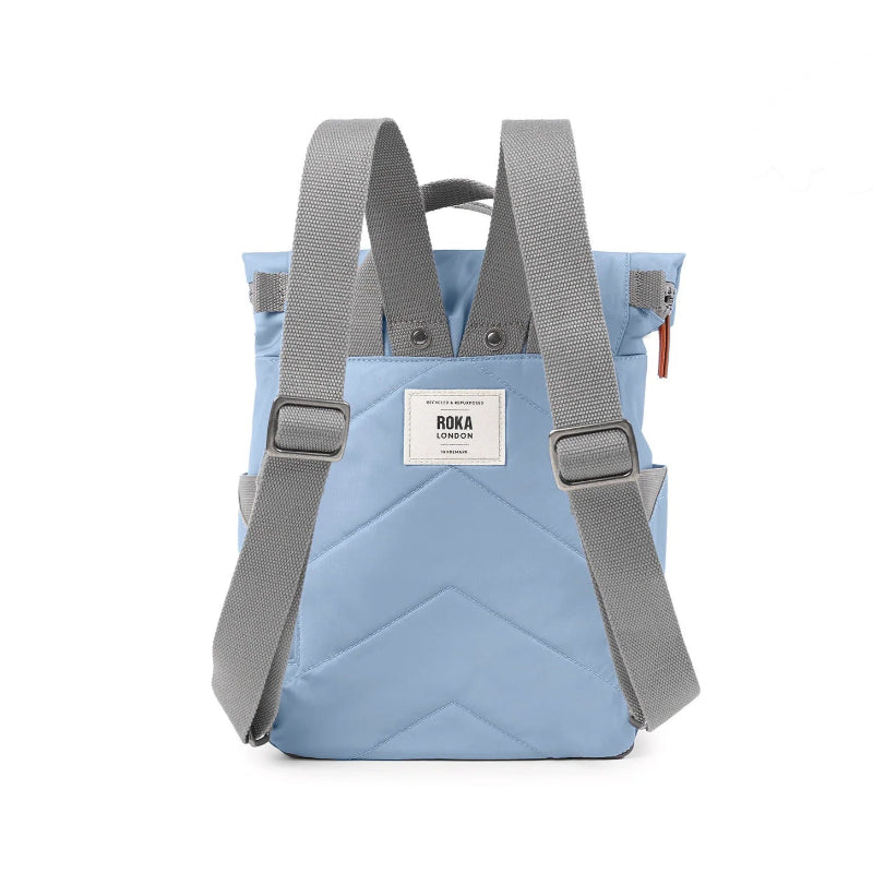 Light blue backpack with gray straps on a white background
