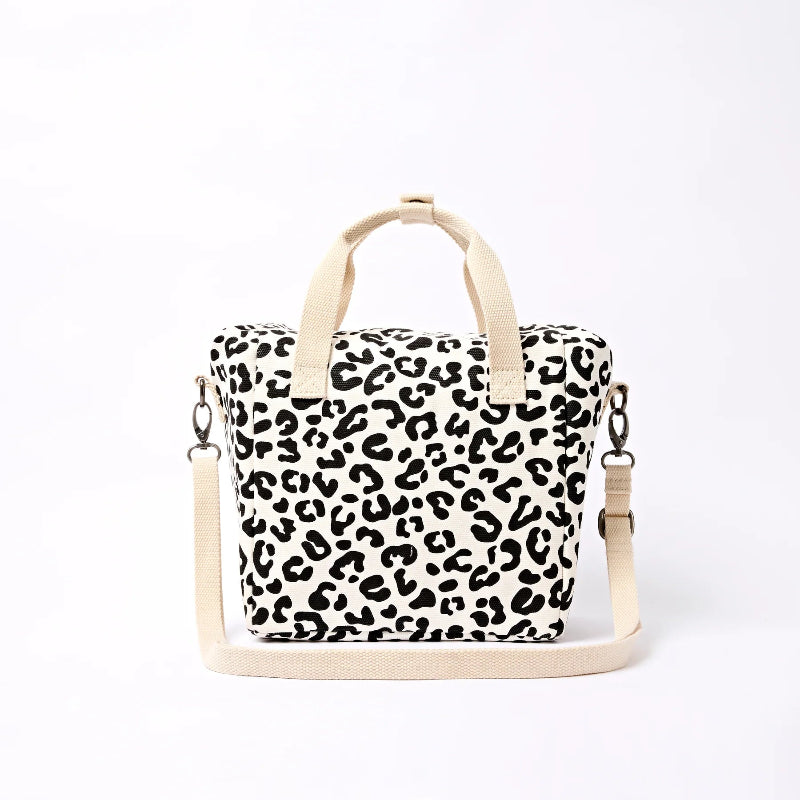 Roka Hampstead lunch bag Leopard print bag with beige straps on a white background