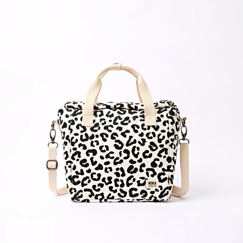Roka Hampstead lunch bag in Leopard print with beige straps on a white background