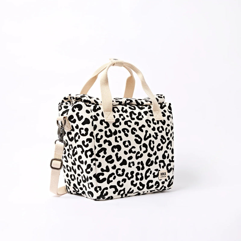 Roka Hampstead lunch bag in Leopard print with beige straps on a white background