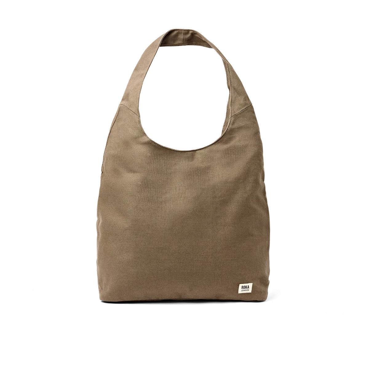 A slouchy hobo-style shoulder bag in a muted taupe-brown fabric, featuring a small white brand patch on the bottom right corner, set against a plain white background.