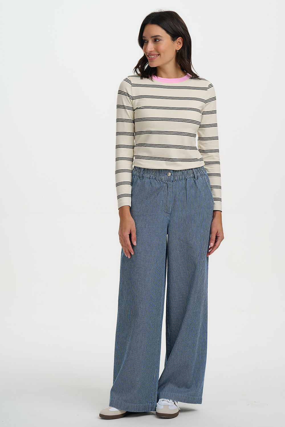 Woman wearing Sugarhill Fifi Wide Leg Trousers on a white background