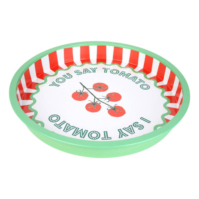 Decorative plate with tomato design and text on a white background
