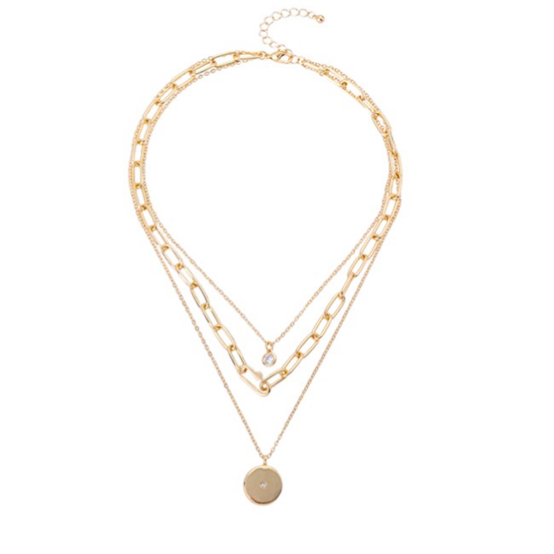 Gold chain necklace with layered design on a white background