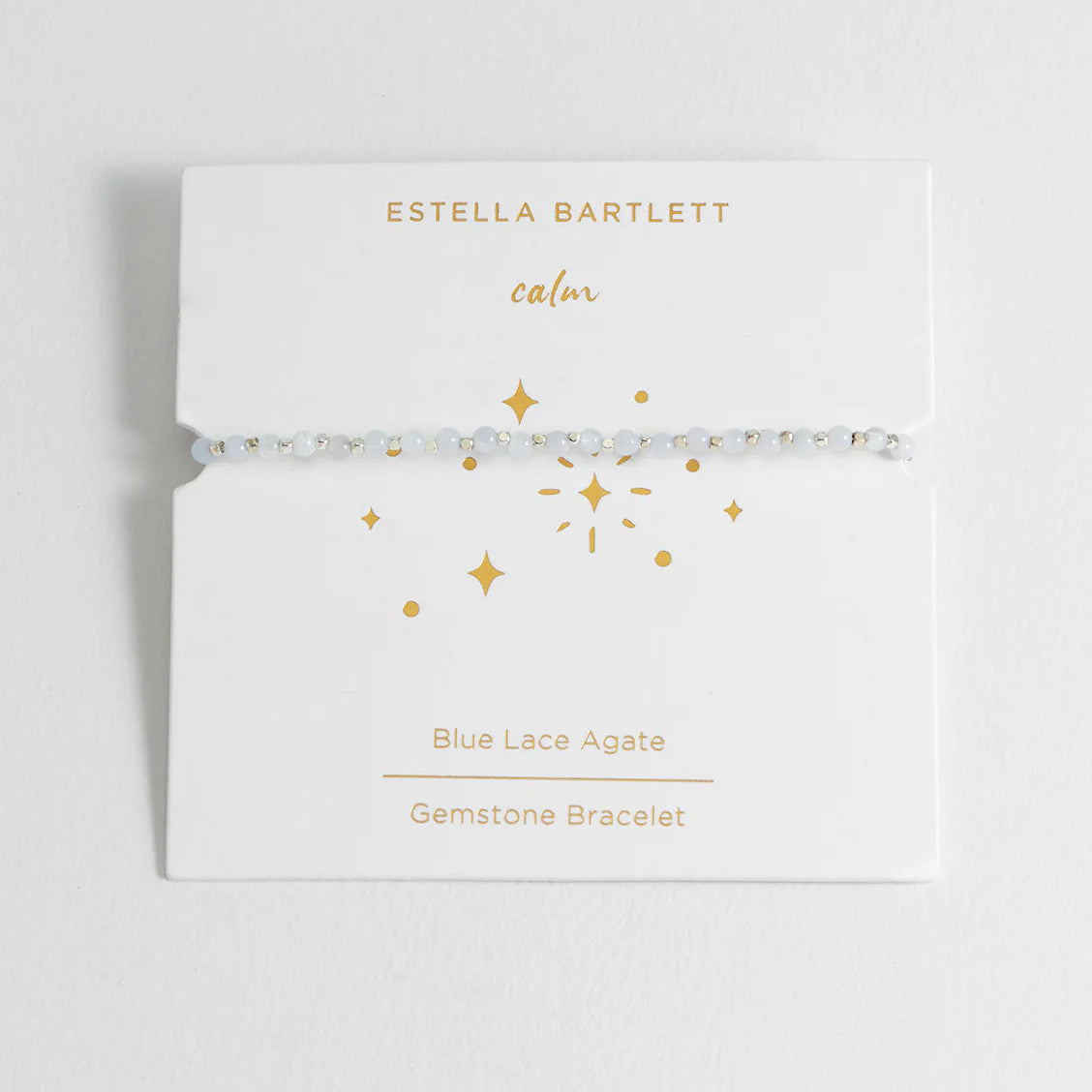 Estella Bartlett jewelry packaging with 'Blue Lace Agate Gemstone Bracelet' on a white background