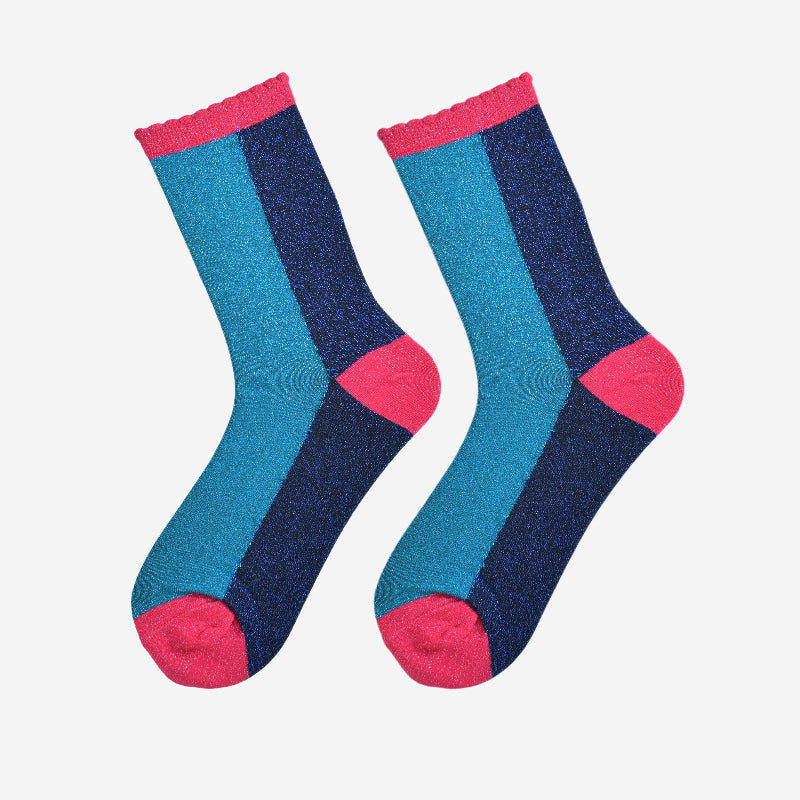 Pair of socks with blue and pink pattern on a white background