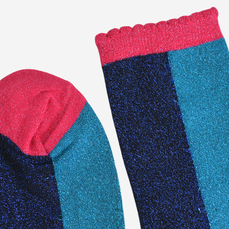 Two pairs of colorful socks with a pink and blue pattern on a white background