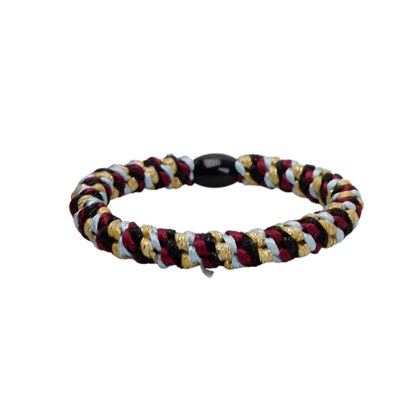 Multicolored braided bracelet with a black bead on a white background