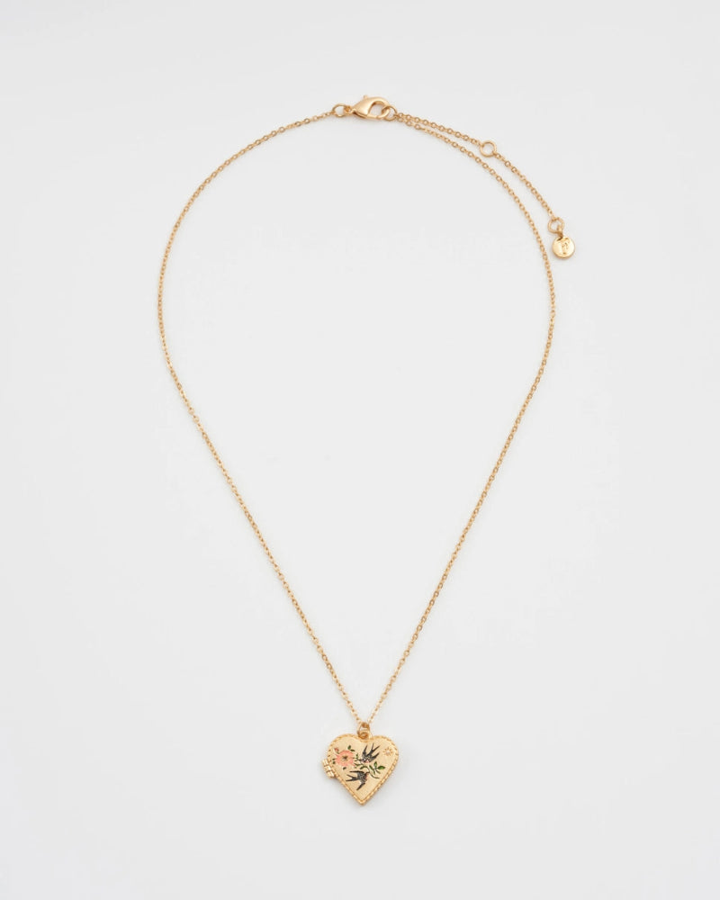 Fable Swallow Heart Locket Chain Necklace on a light grey background