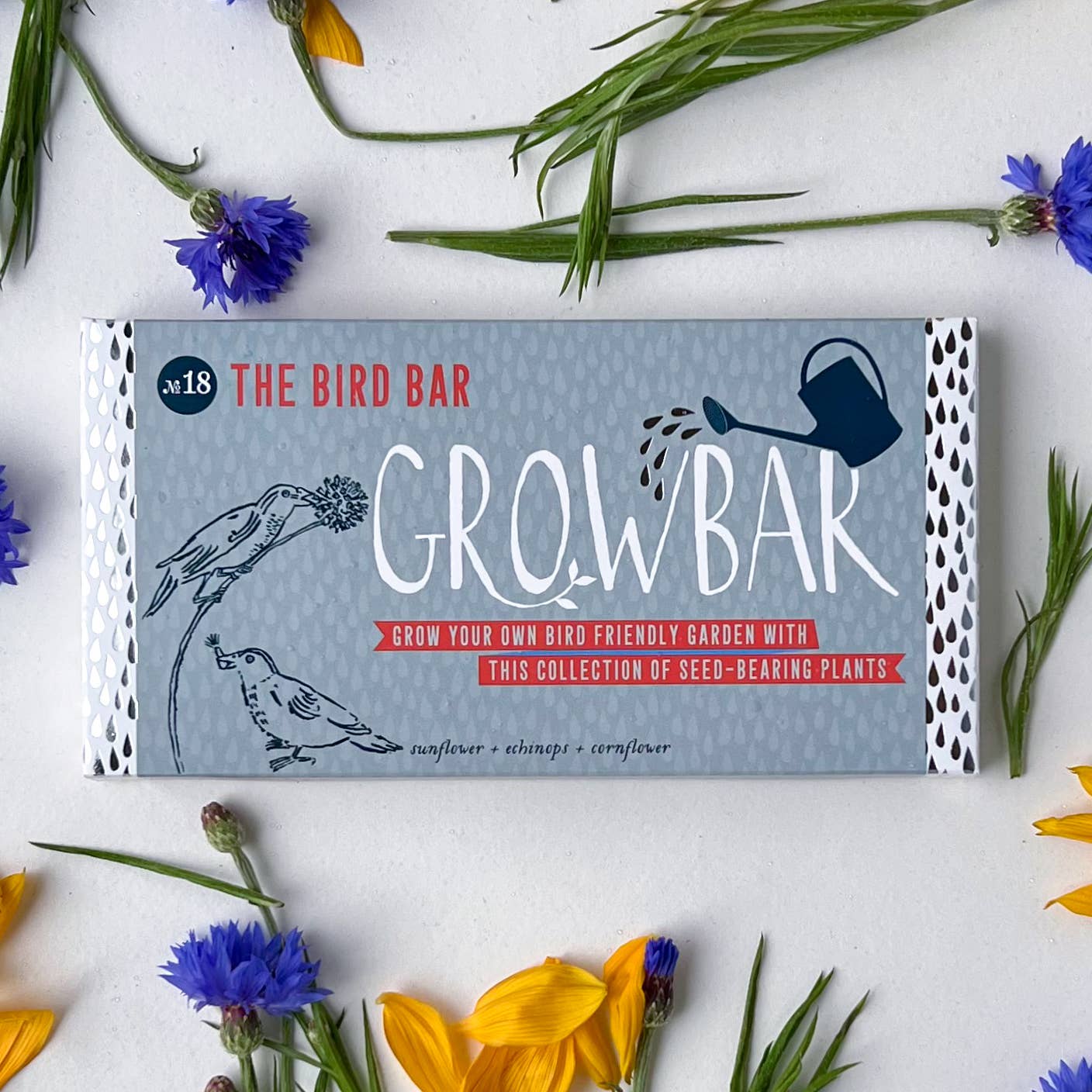 Grow bar packaging for seed-bearing plants with flowers and plants around