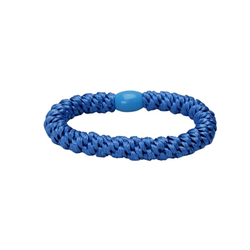 Blue braided bracelet on a white background