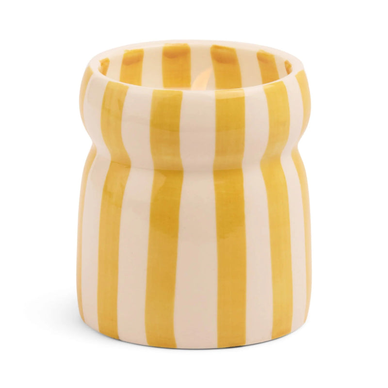 Transport yourself to the world’s most beautiful beaches with our Cabana collection each designed to evoke the soothing transformative scents of coastal destinations. These hand painted candles inspired by striped umbrellas are perfectly sized and featured a unique pinched form.
After the candle has burned the food-safe ceramic vessel can be repurposed for your own culinary creations or as a charming decorative piece!