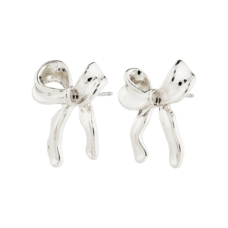 Silver bow-shaped earrings on a white background