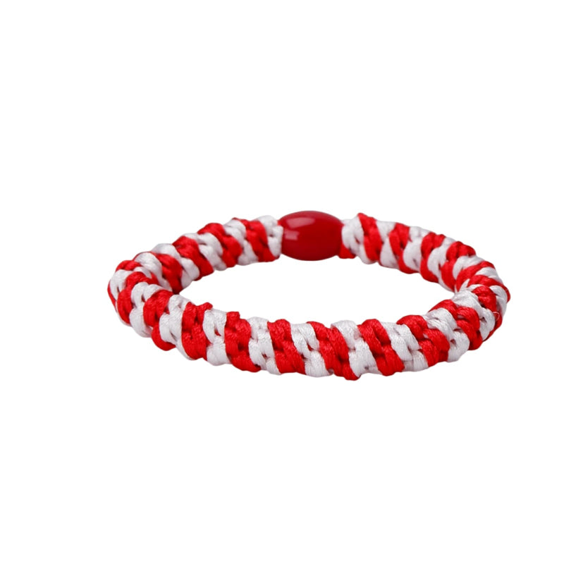 Red and white striped rubber band on a white background