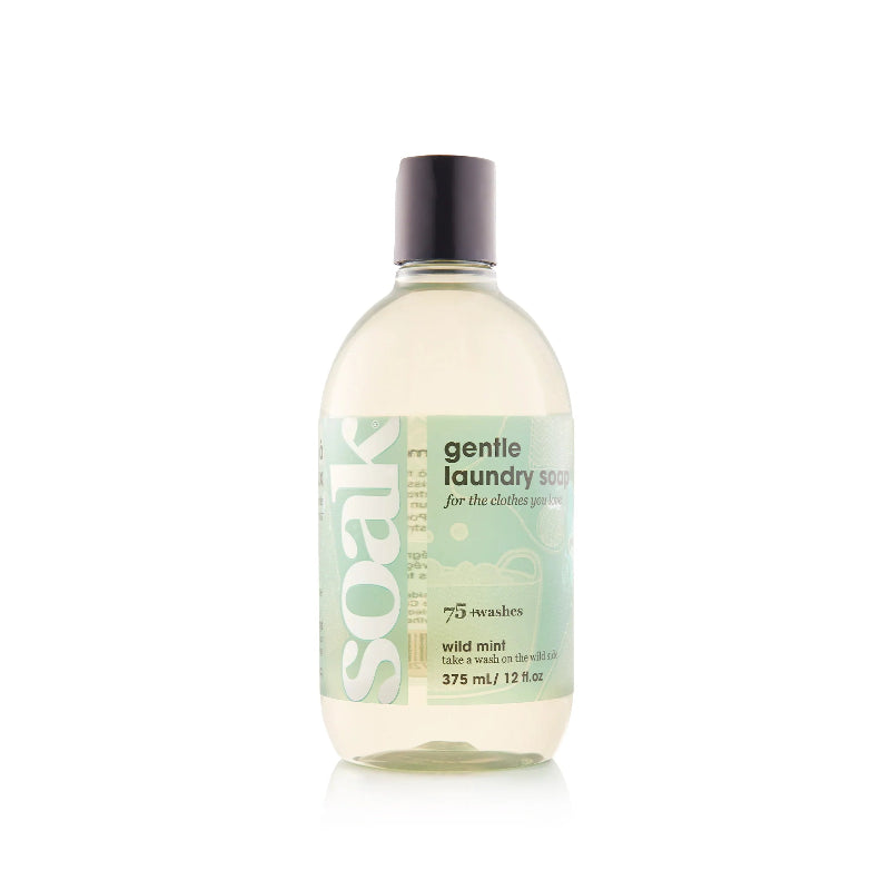Bottle of Soak gentle laundry soap on a white background