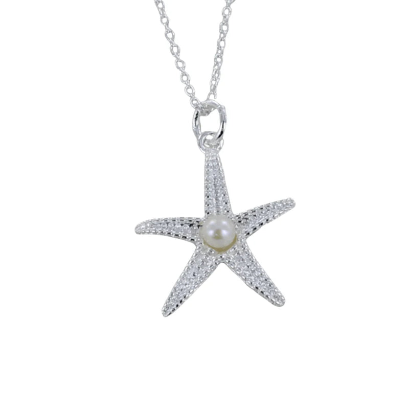 Starfish-shaped pendant with a pearl center on a chain against a white background