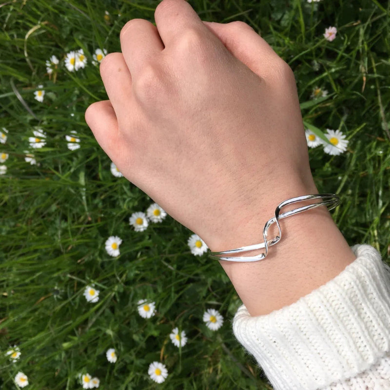 Twist Silver Bangle on wrist