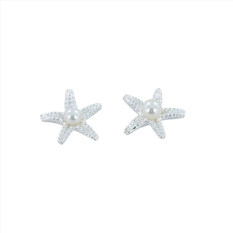 Starfish-shaped earrings with pearls on a white background