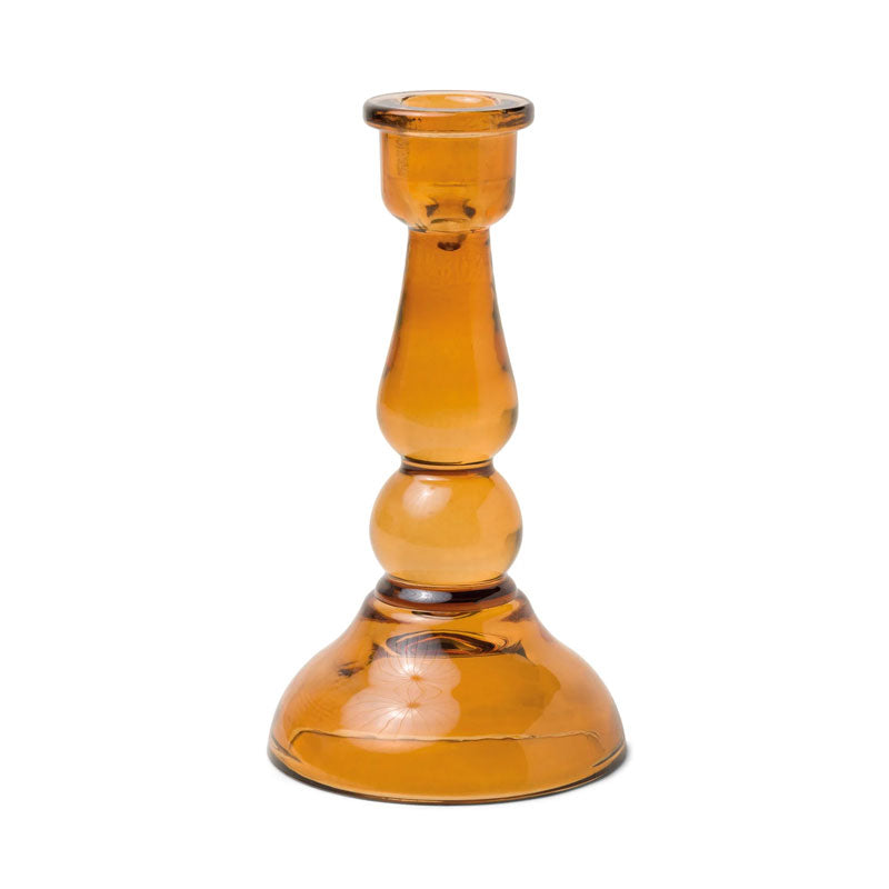 Clear glass candle holder in amber
